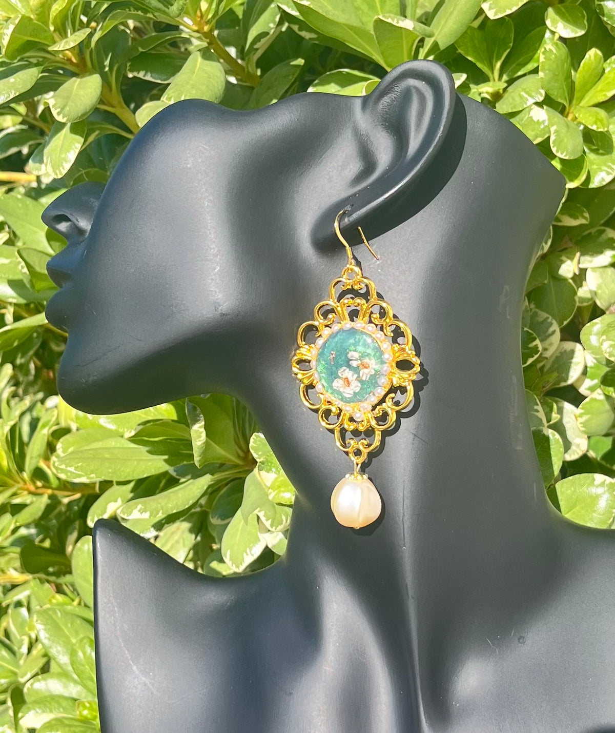 LARGE GREEN FLORAL DANGLES