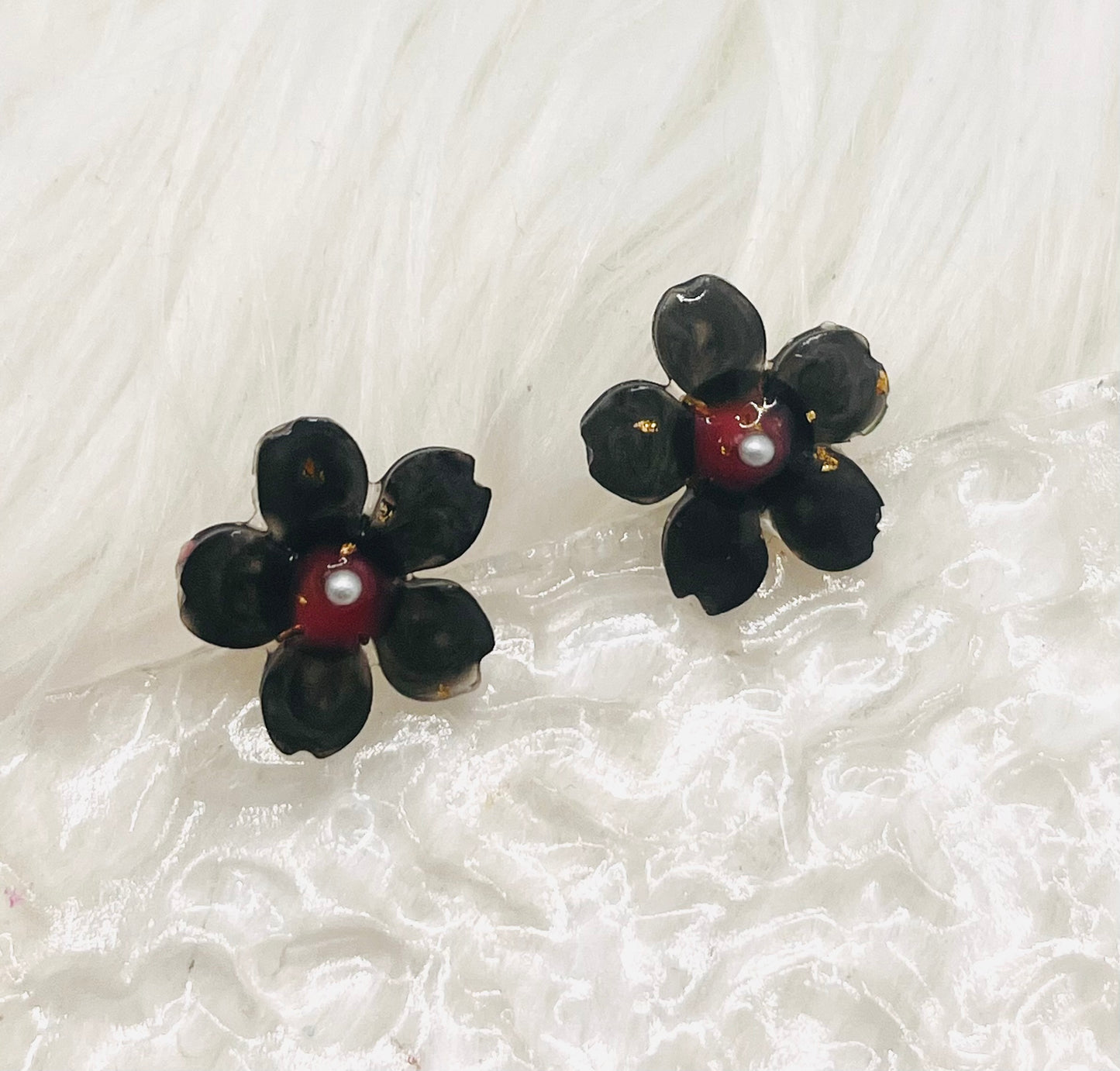 BLACK FLOWER STUDS