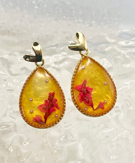 YELLOW FLORAL DANGLES